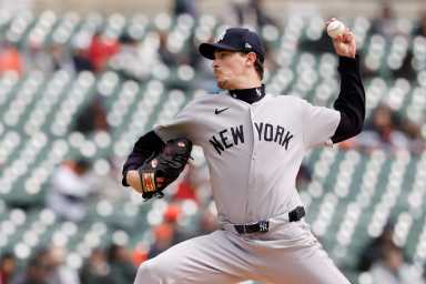Yankees pitcher Max Fried throwing ball