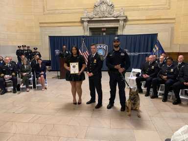 MTA police with a dog inside terminal