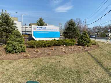 lawn on a sunny day in front of a Staten Island hospital